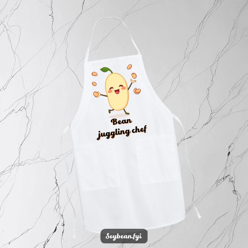 Funny apron showcasing a jovial soybean character happily juggling its own beans, perfect for cooks who enjoy a playful atmosphere.