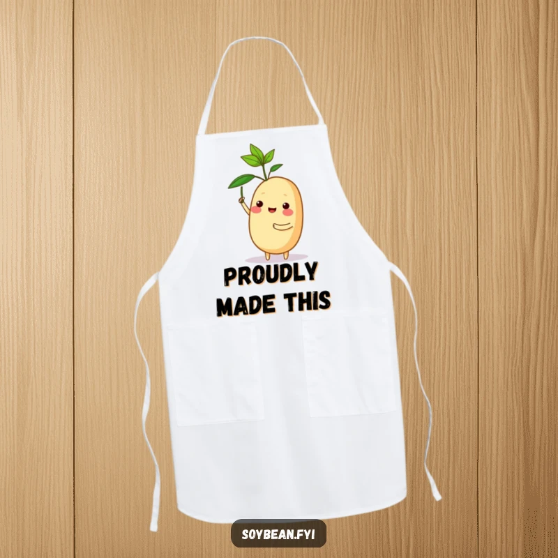 Funny apron with a proud soybean character holding a tiny sprout, celebrating cooking achievements with humor.