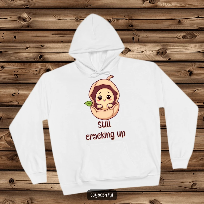 Funny soybean character peeking from a cracked bean pod on a cozy hoodie, perfect for humor lovers.