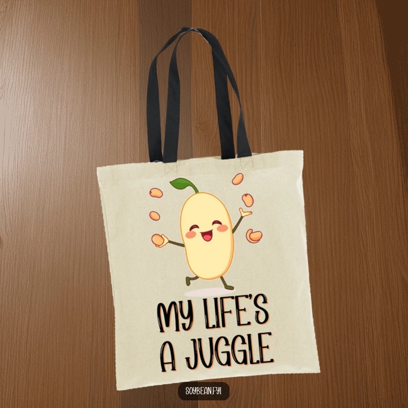 Funny tote bag showcasing a jovial soybean character happily juggling its own beans, perfect for shopping with a smile.